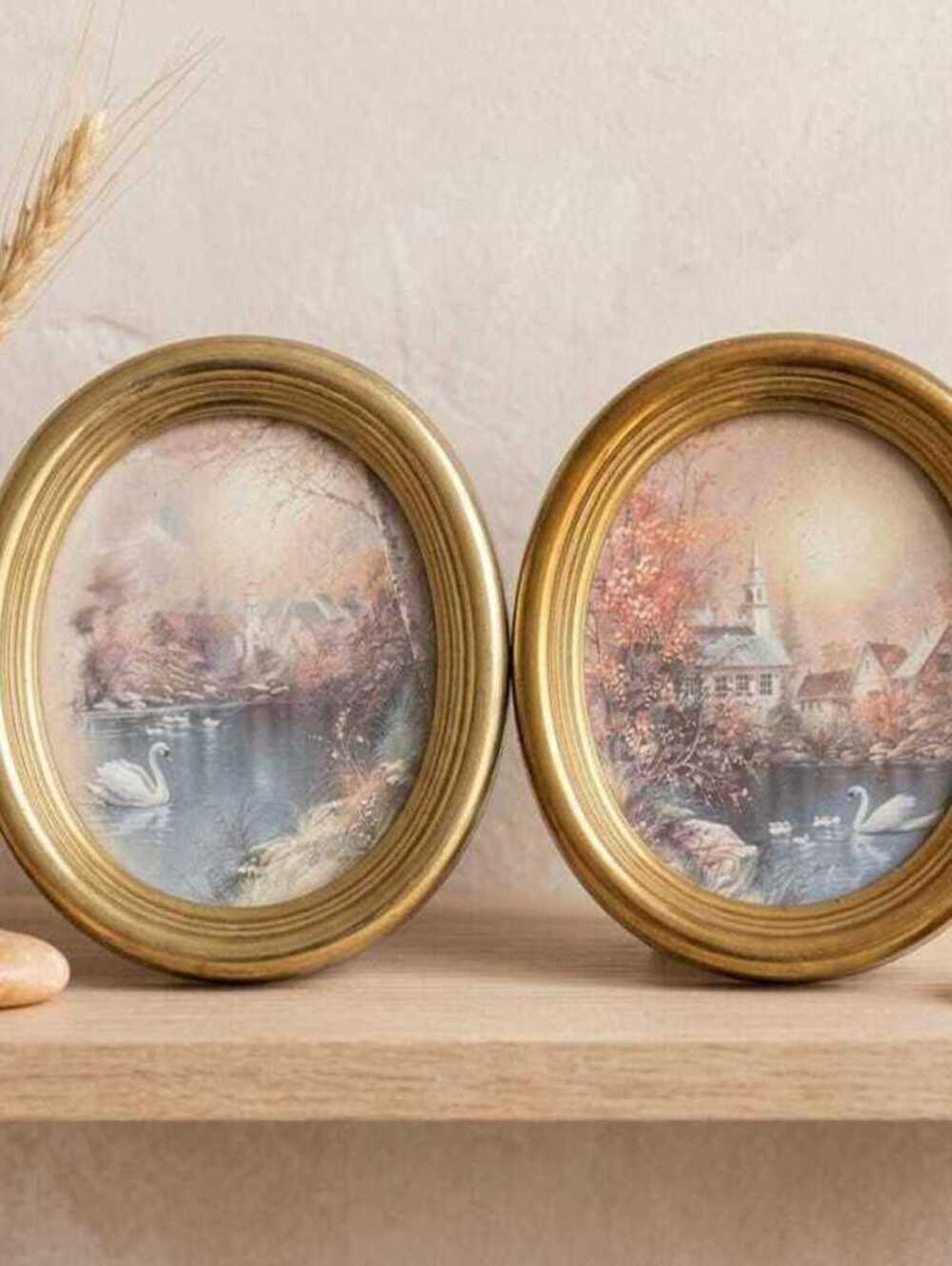 Pair of Vintage Oval Gilt Picture Frames with Serene Swan Lake Prints